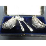 A cased silver condiment set