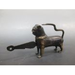 An ancient Persian style bronze padlock in the form of a lion with its key