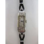 A 1930's 18ct white gold cased ladies cocktail watch