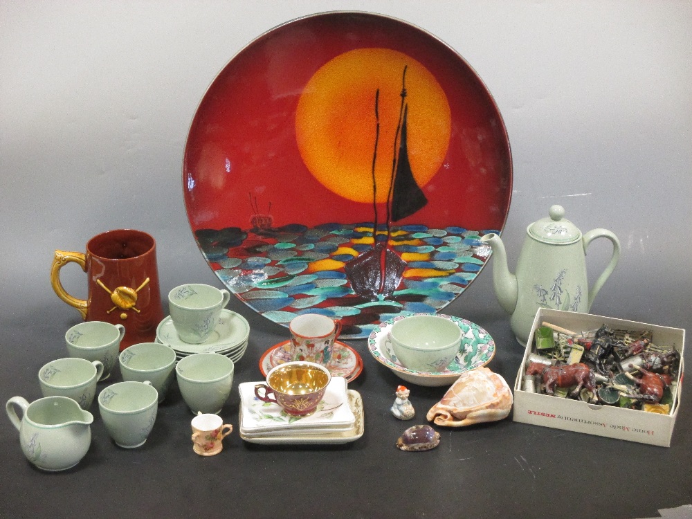 Anita Harris charger painted with a sailing boat at dusk, 42cm; a Dartmouth Pottery mug decorated