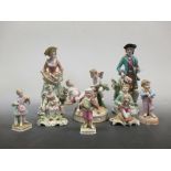 A pair of Continental porcelain figures, Shepherd and Shepherdess, a pair of child figures and