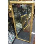 A gilt framed pier glass, 111 x 41cm