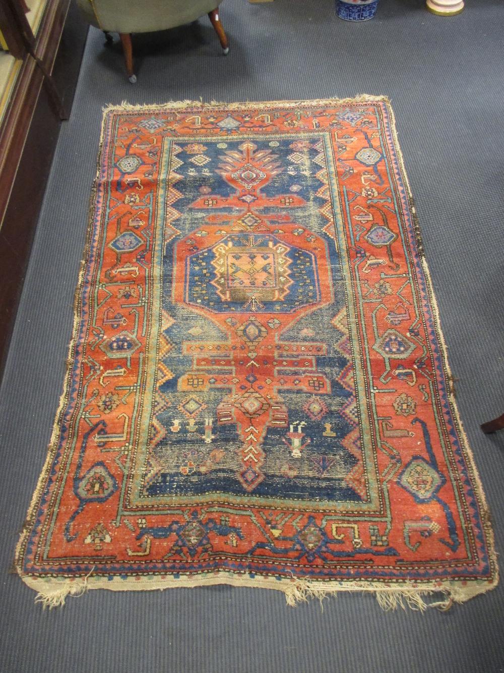 A Turkish rug, 200 x 128cm