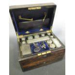 A 19th century Calamander toilet box with silver fitted interior