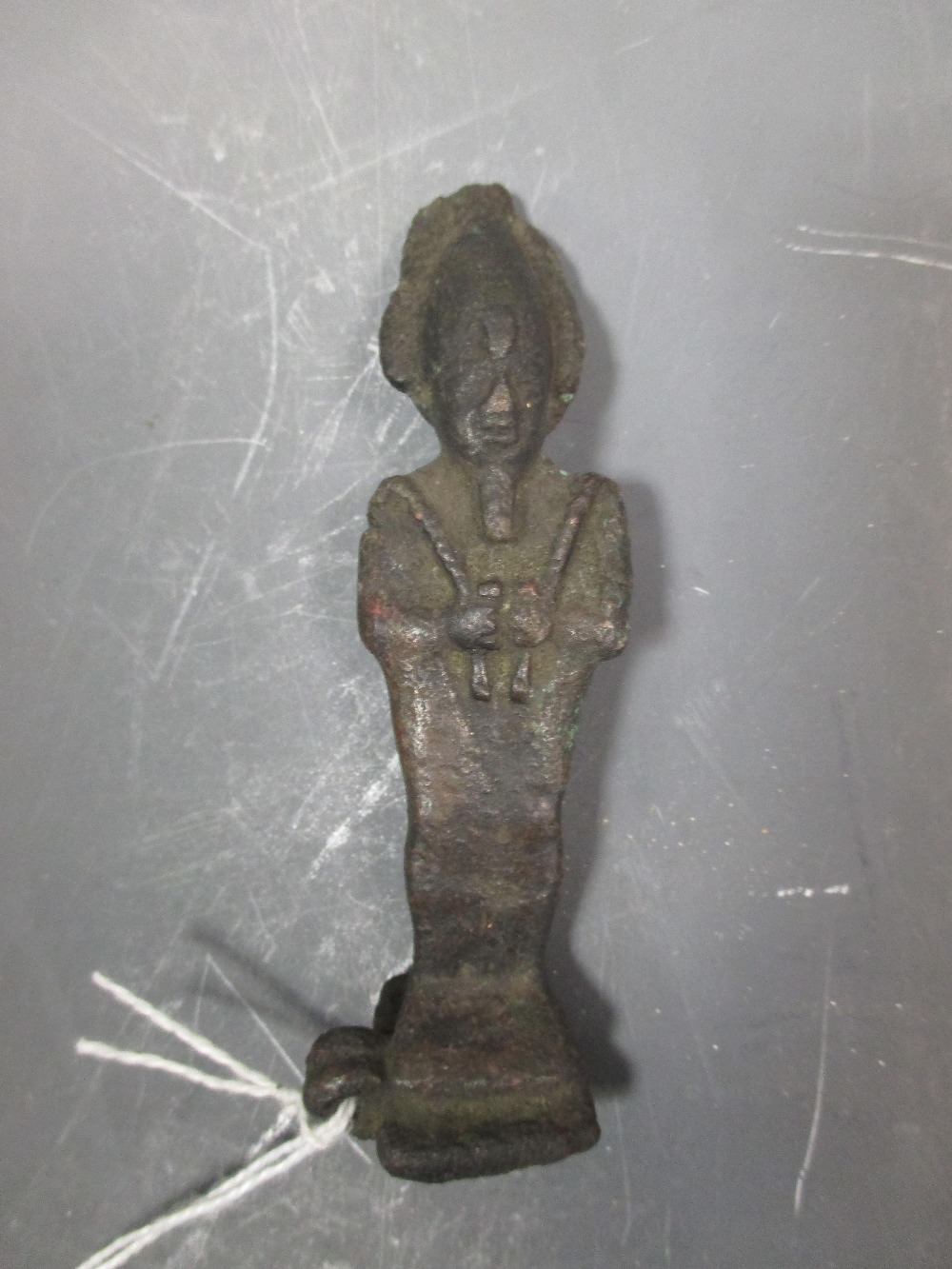 An Egyptian bronze figural amulet depicting Osiris, late period 664-332BC, 9.5cm high