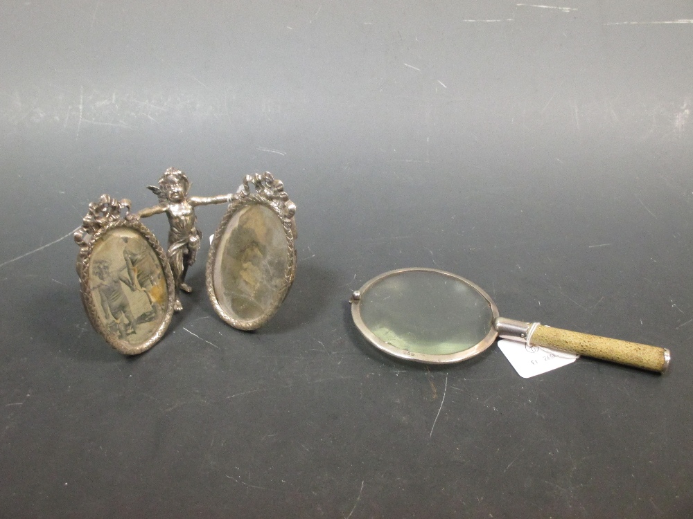 A silver mounted magnifying glass with shagreen handle and a Dutch silver double oval photograph