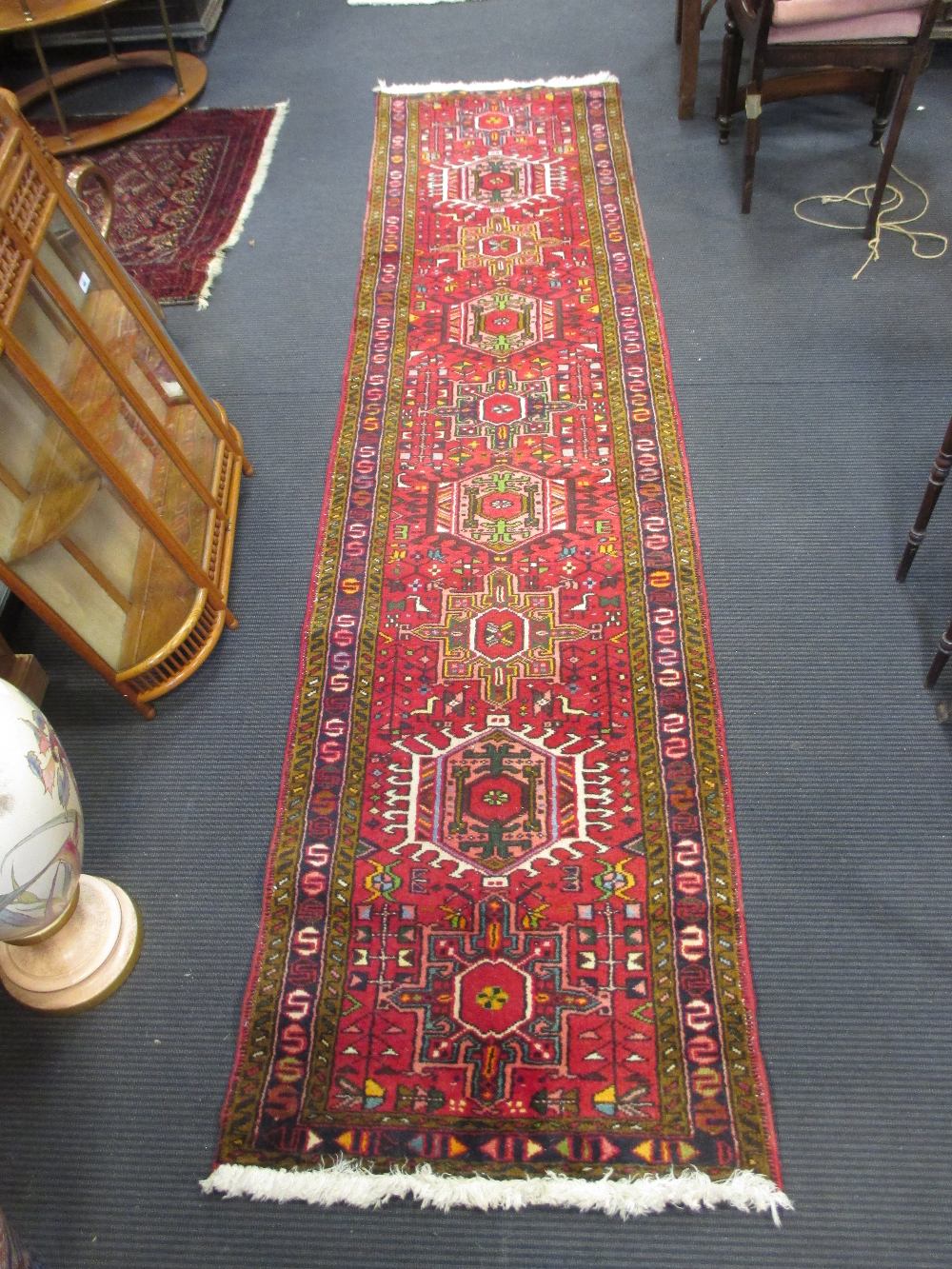 Two modern Persian red ground runners, 290 x 69cm and 204 x 68cm(2)