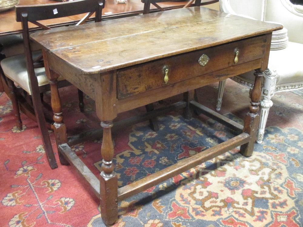 An 18th century oak side table with single drawer, 71 x 102 x 59cm