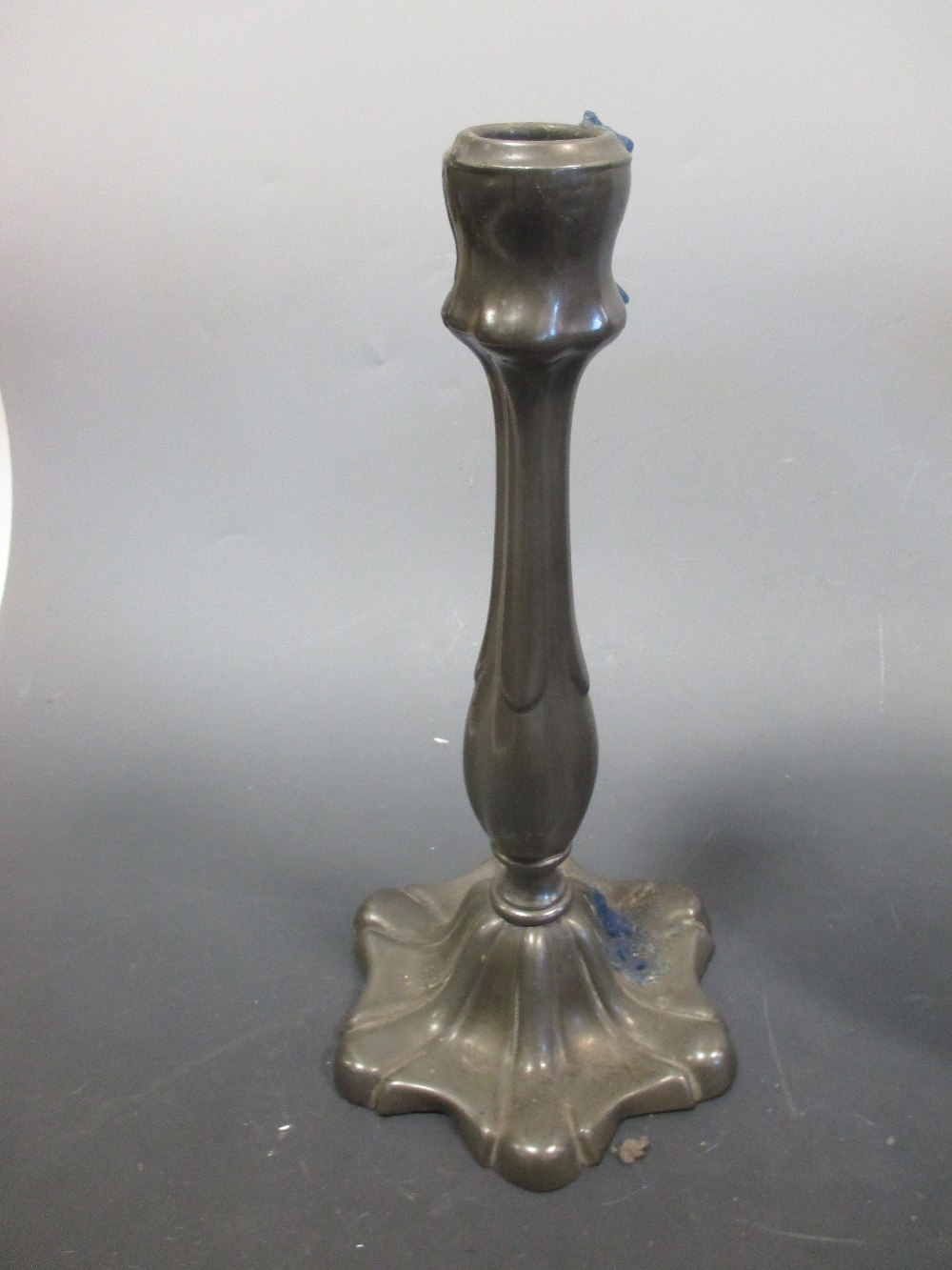 Seven 18th/19th century pewter plates, a warming dish base and a pair of candlesticks - Image 2 of 3