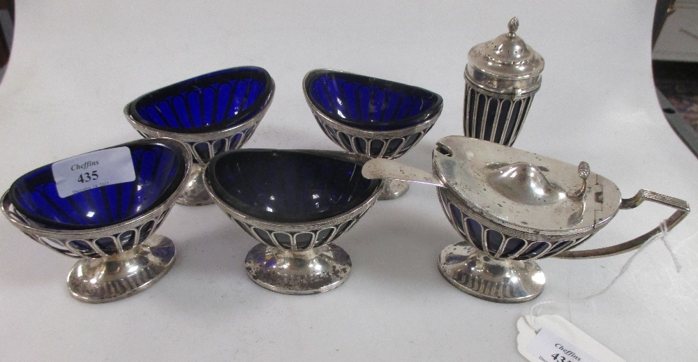 A matched set of four silver salts, a pepper, a mustard and spoon, Goldsmiths and Silversmith's