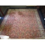 A large Persian style carpet, 410 x 300cm