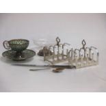 Two silver toast racks, silver and glass small pedestal bowl, Polish silver and enamel cup and