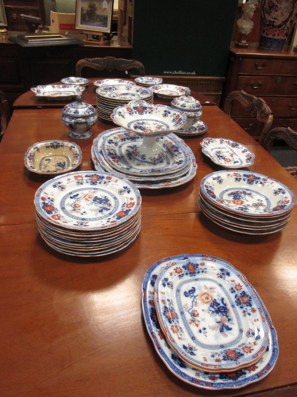 A Davenport 'flow-blue' part dinner service, imari pattern, condition varies, impressed and other