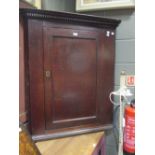 A George III oak corner cupboard 88cm wide