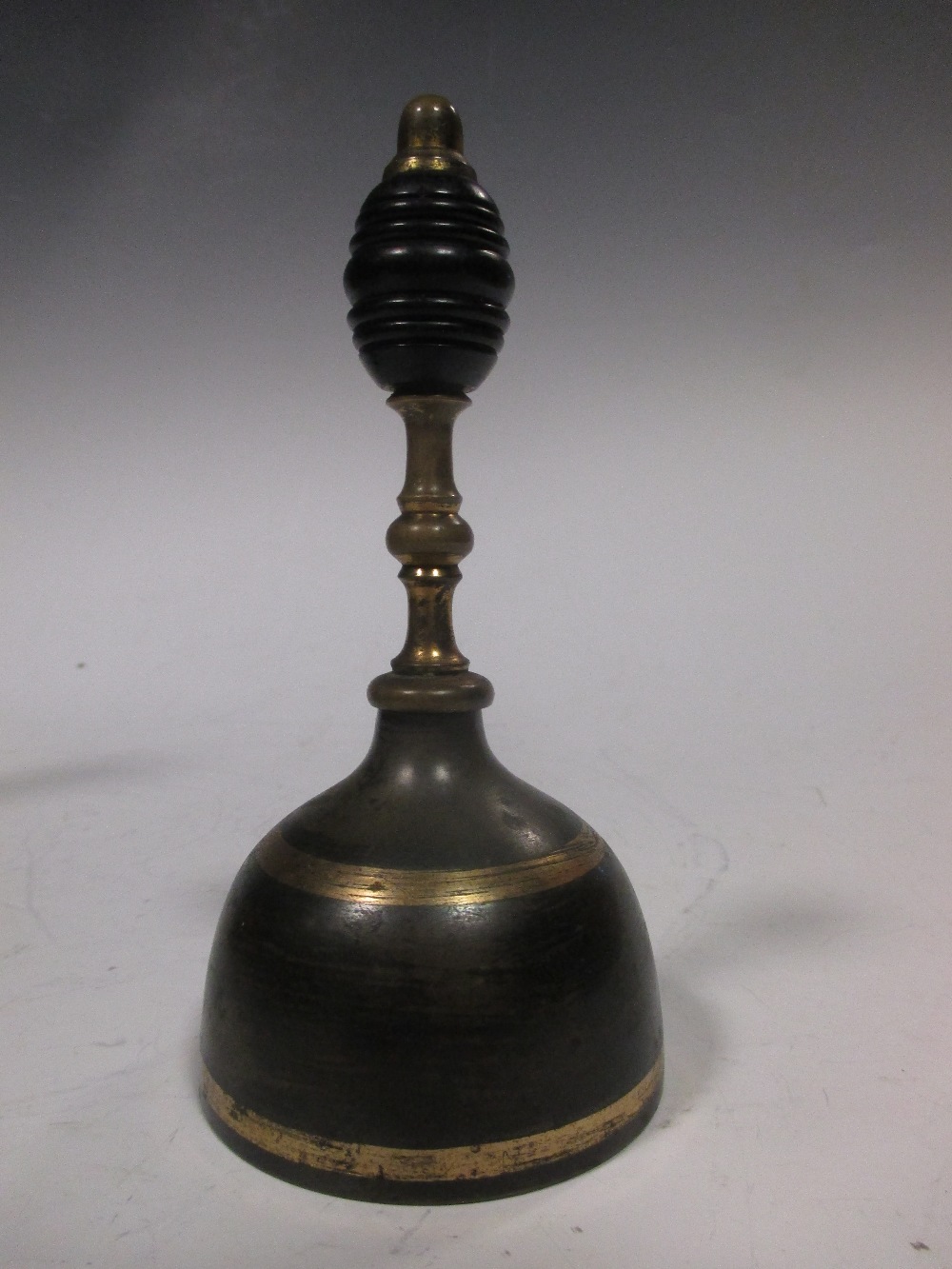 A pair of brass footed white columnar candlesticks and a handbell together with a quantity of - Image 2 of 4