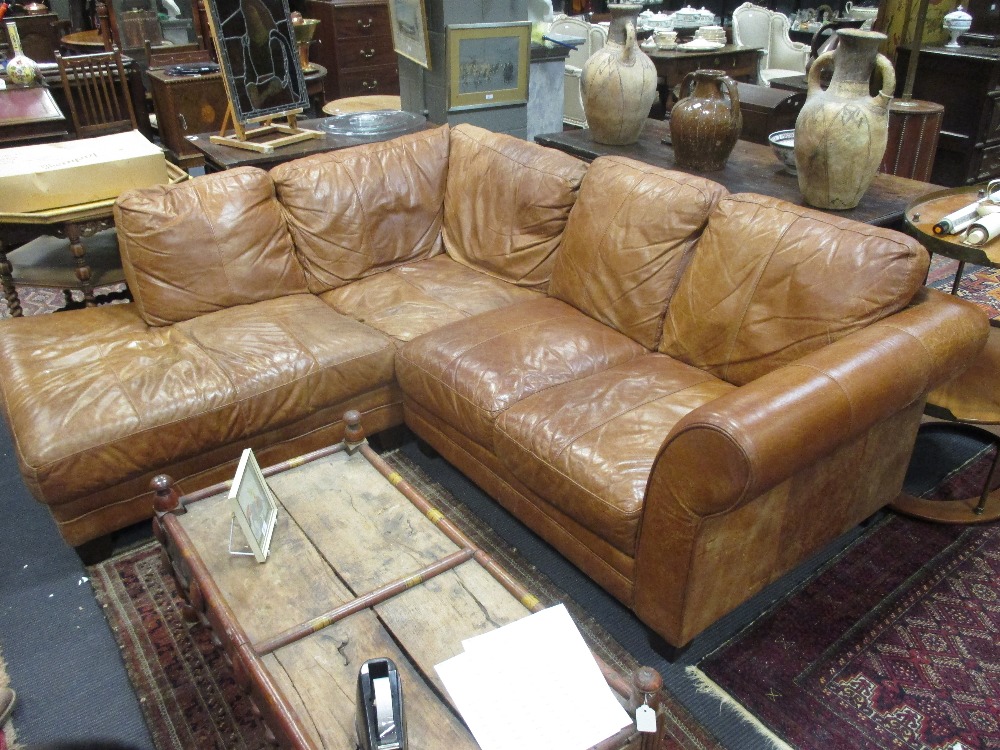 A contemporary caramel leather corner sofa, 230 x 200cm