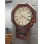 An 19th century octagonal mahogany cased wall clock -No signs of any marks or writing on or inside