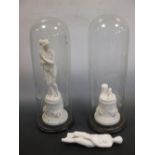 A pair of marble figures under glass display domes (2)