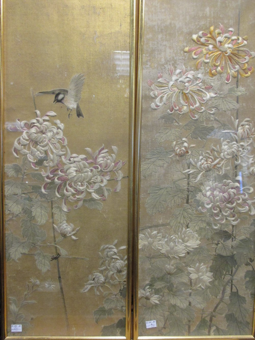 A series of three framed Oriental painted panels on silk (3)