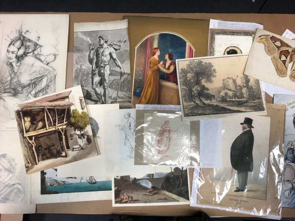 A collection of prints, drawings and sketches, a varied assortment in a folder