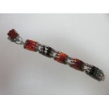 A 19th century banded agate and silver bracelet, composed of five rectangular reeded and slightly