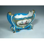A Sevres style jardiniere, the shaped oval pedestal body moulded with acanthus, the bleu celeste