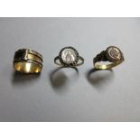 Three 18th and 19th century mourning rings, the first with an oval ivory plaque painted en grisaille