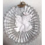 An 1830s sulphide plaque of Napoleon and Marie Louise, probably Baccarat, the star cut clear glass