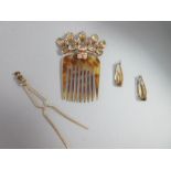 A 19th century citrine hair ornament / brooch together with a pair of similar citrine brooches,