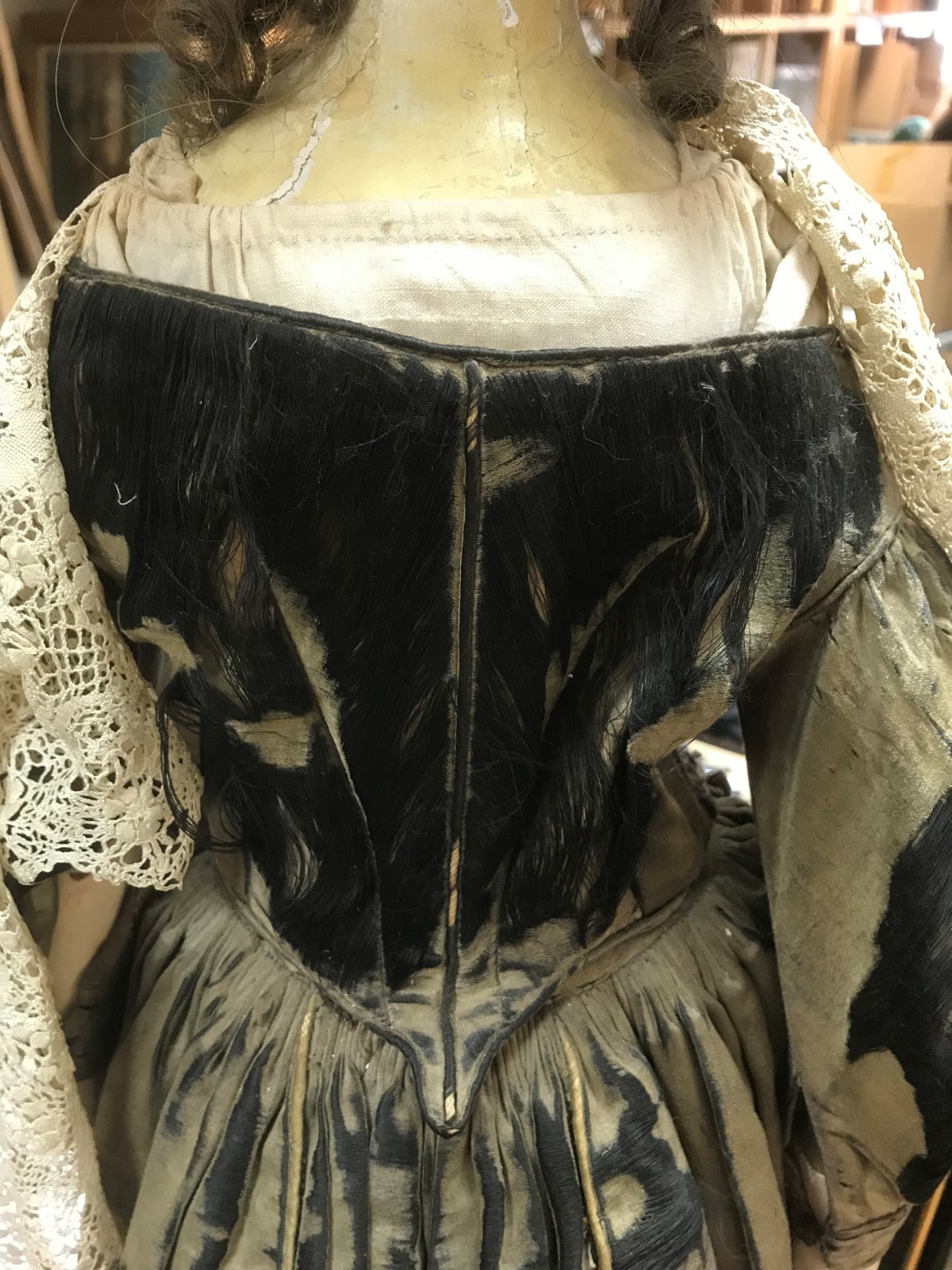 Miss Timber', an 18th century painted wood doll, she wears a lace shawl over her brown silk dress, - Image 10 of 11