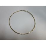 An Italian ribbon link collar necklace, the narrow polished flexible circle of smooth continuous