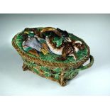 A Minton Majolica two handled game pie dish and cover, circa 1870, the cover typically moulded