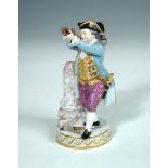 A Meissen figure of a young boy holding a crossbow, circa 1900, after a model by Acier, standing