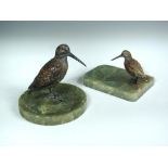 An Austrian cold painted bronze model of a Woodcock, mounted to a green onyx ashtray base,