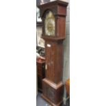 Henry Fenton, Bilsby. An 8 day longcase clock, the carved oak later case with arched brass dial,