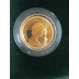 A 1980 gold sovereign, cased