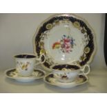 A Spode tea service to comprise ten teacups, eleven saucers, eleven coffee cups, one milk jug, one