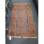A Hamadan blue ground rug, 200 x 110cm