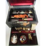 A jewellery box containing a quantity of mixed jewellery to include gold, coral, pearls,