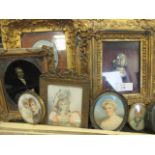 A collection of portrait miniatures and a framed silvered profile of a Georgian man