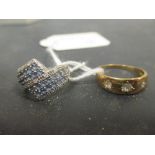 A three stone diamond ring, Birmingham 1987, size M (3.3g) and a pale blue hardstone and diamond