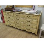 A Venetian style chest of three banks of drawers 88 x 172 x 56cm