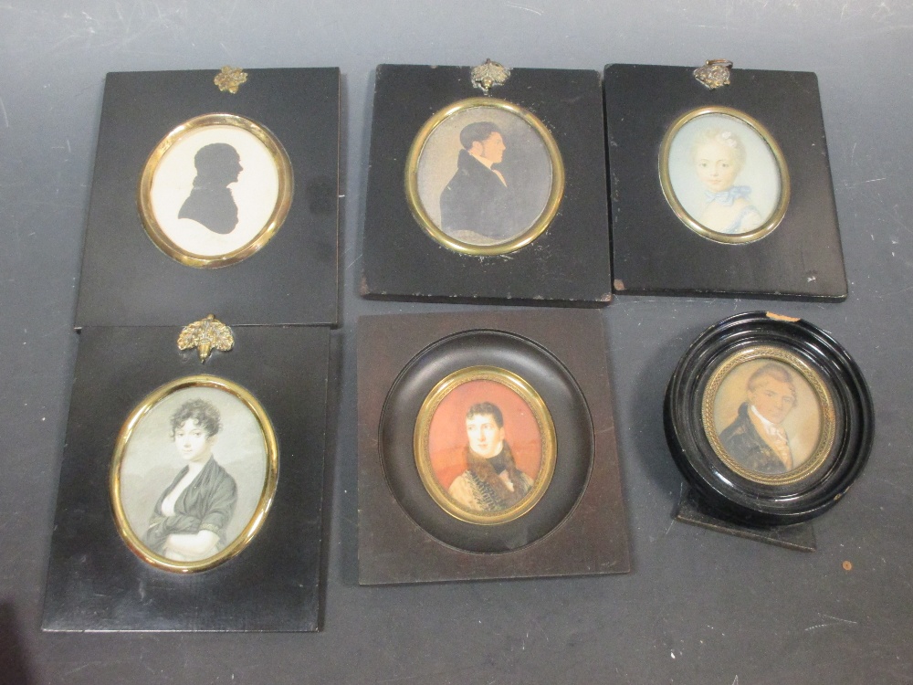 Three 19th century portrait miniatures, two others and a silhouette