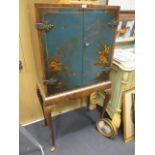 A 20th century walnut cocktail cabinet, with blue lacquered doors, 144 x 69cm