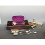 A silver sugar caster, cigarette box, sifter spoon and other items