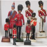 A group of Continental porcelain Grenadier Guards and another (7)