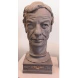 A limited edition Wedgwood black basalt bust of Lester Piggott OBE; A Royal Worcester blush ivory