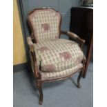 One pair and one other Louis IV open arm chairs with elephant motif upholstery (3)