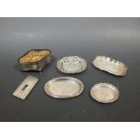 A silver vesta, ring box, pin tray and three European silver pin trays