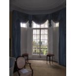 Two sets of Country House blue silk lined curtains and pelmets, the first to fit a bay window - each